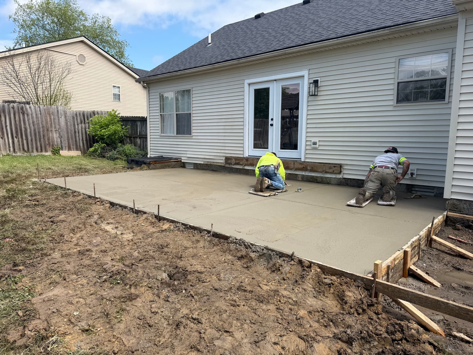 Gallery photos for Old Deck Removed and Replaced With a Clean Concrete Patio: Image #2