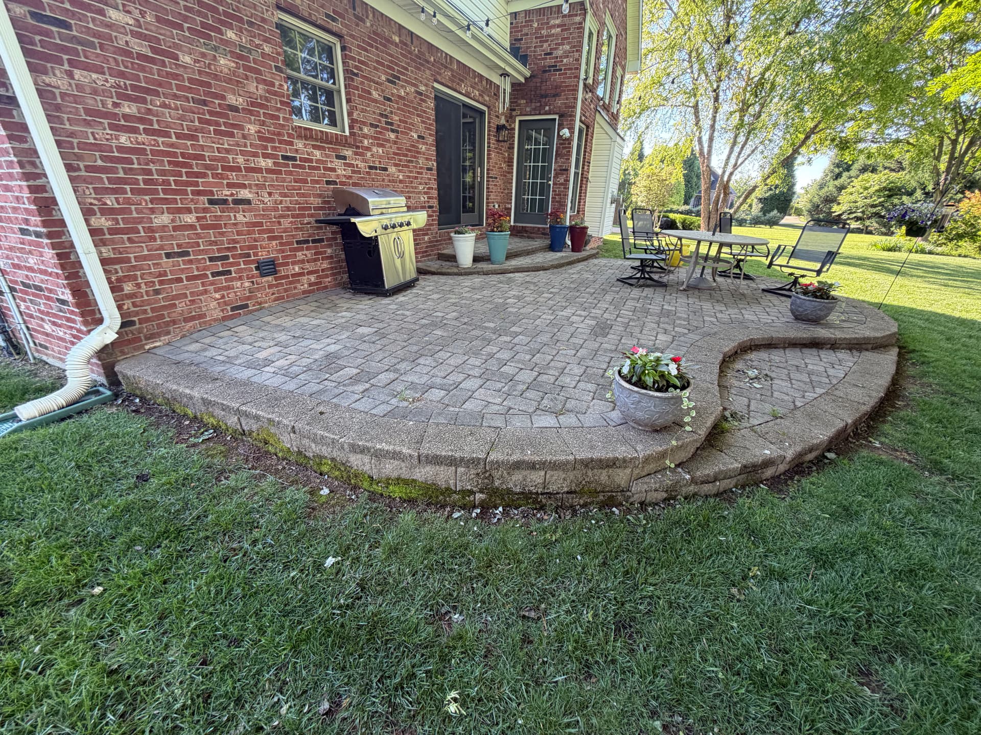 Gallery photos for Sunken Paver Patio Replaced With a Larger Exposed Concrete Outdoor Patio: Image #9