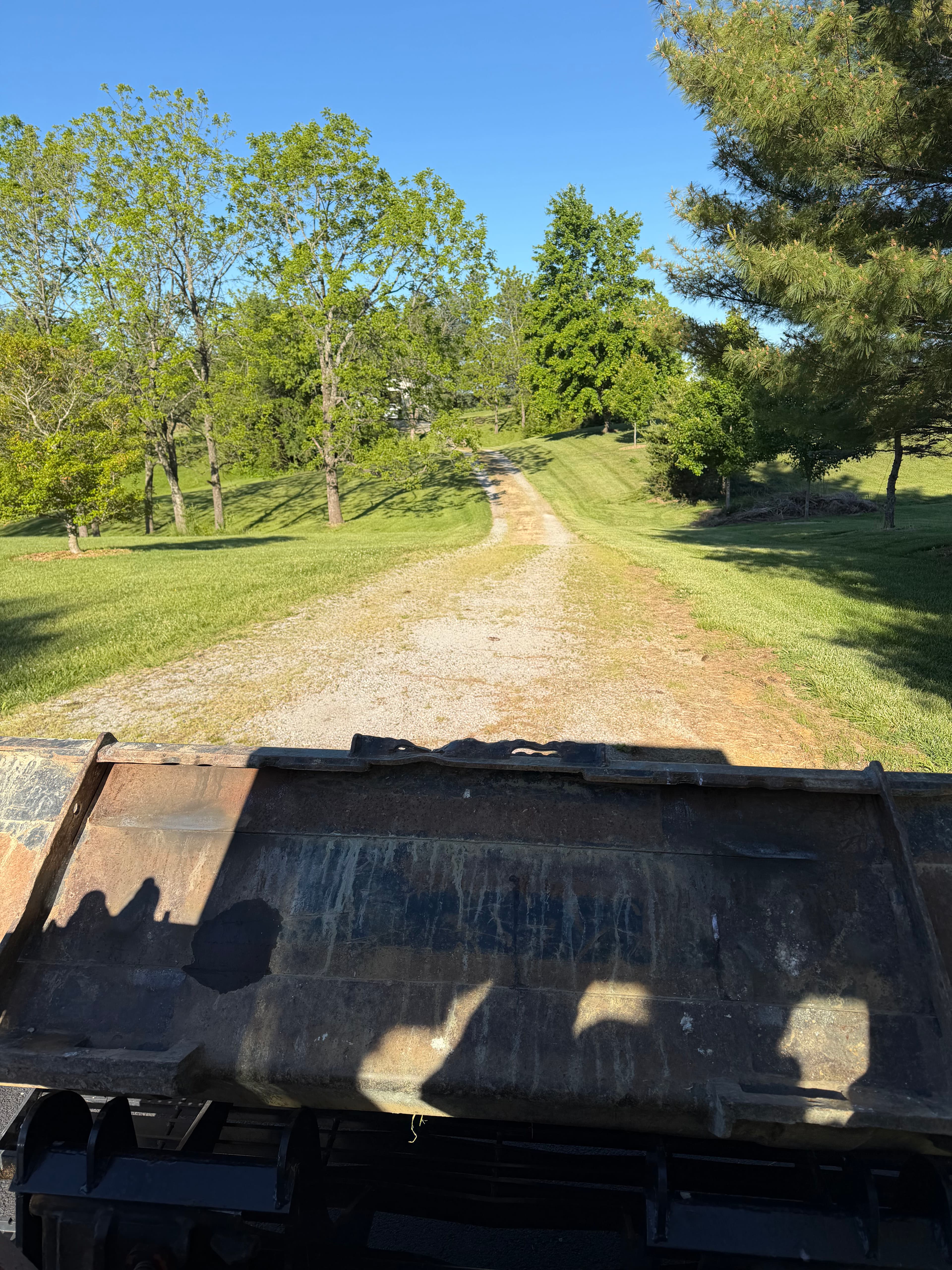 Project Gravel Driveway Cleanup and Finish Grading Done Right image