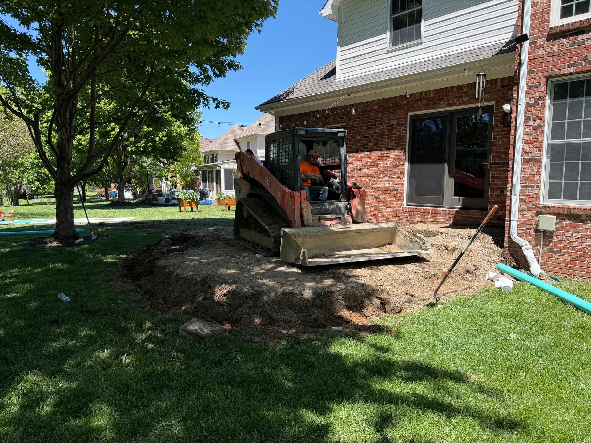 Gallery photos for Sunken Paver Patio Replaced With a Larger Exposed Concrete Outdoor Patio: Image #8