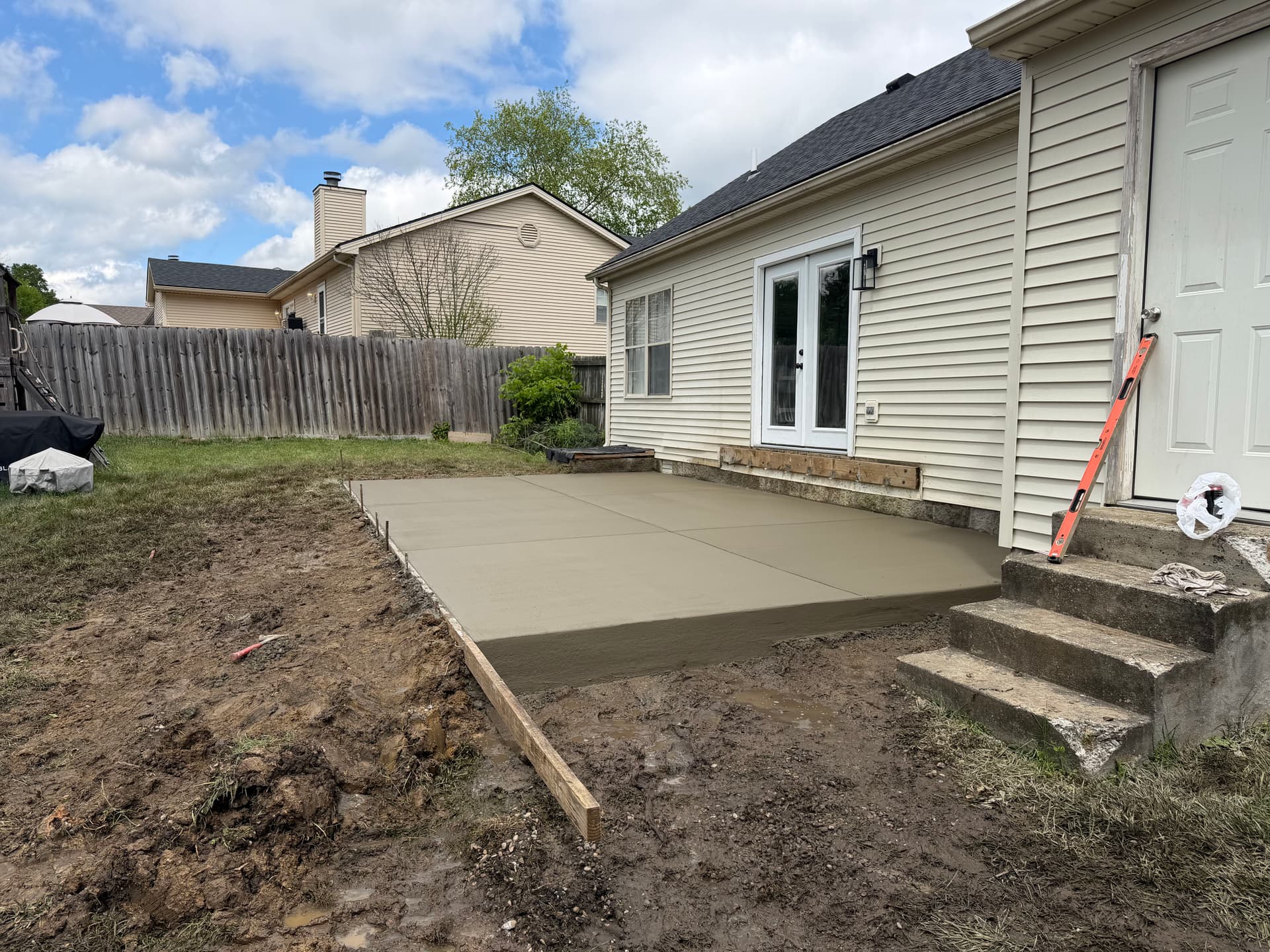 Gallery photos for Old Deck Removed and Replaced With a Clean Concrete Patio: Image #1