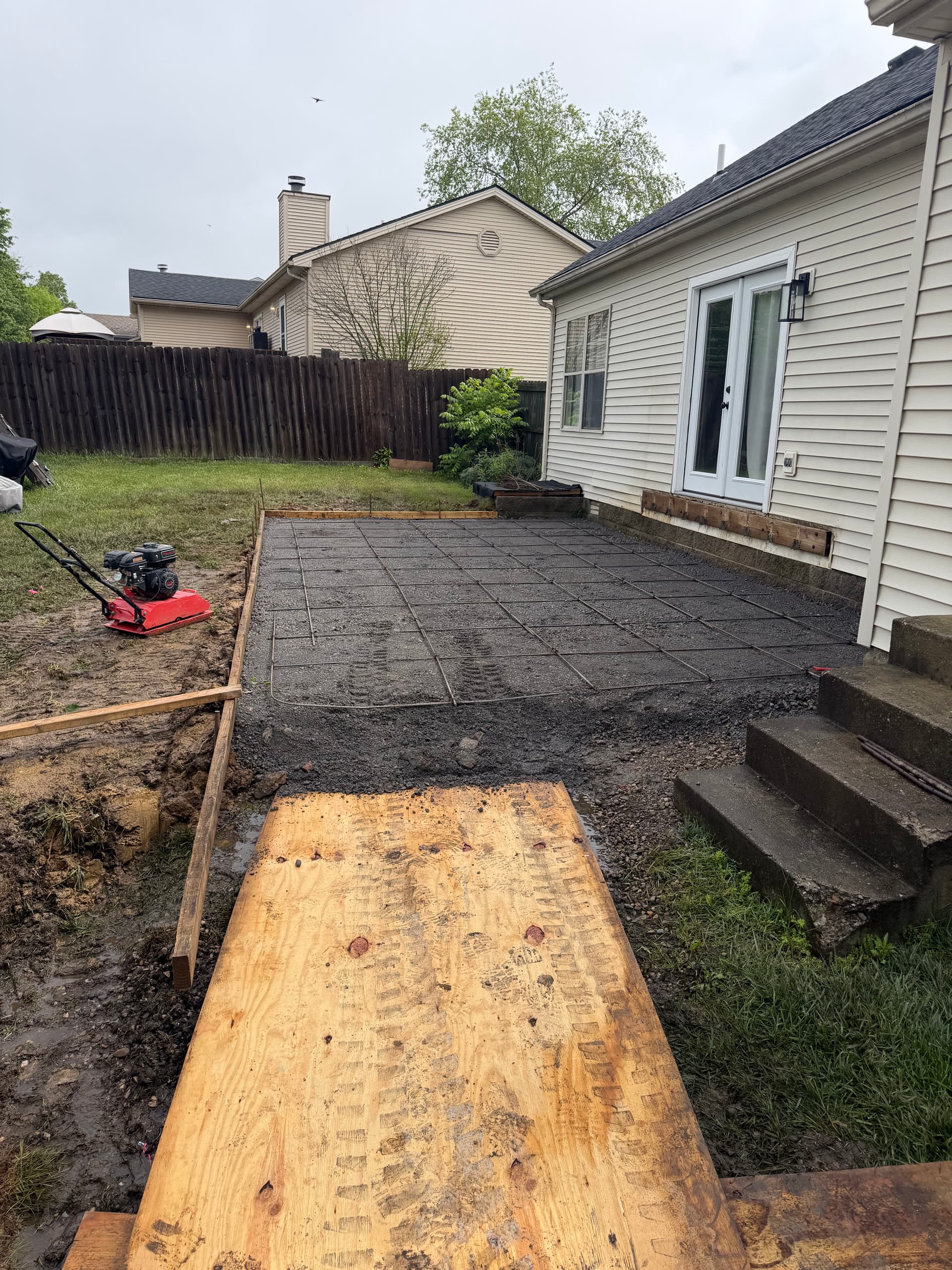 Gallery photos for Old Deck Removed and Replaced With a Clean Concrete Patio: Image #4