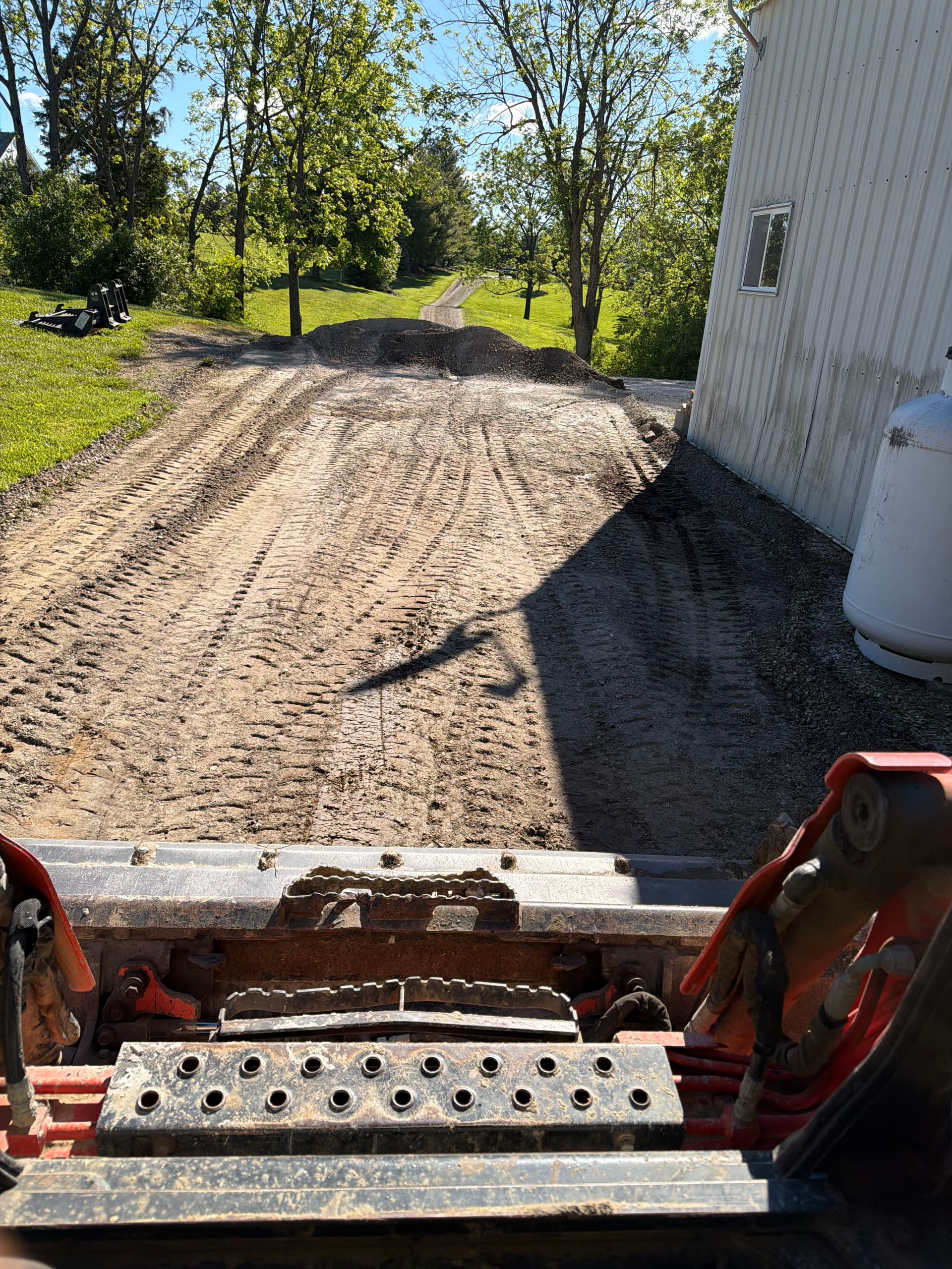 Gallery photos for Gravel Driveway Cleanup and Finish Grading Done Right: Image #4