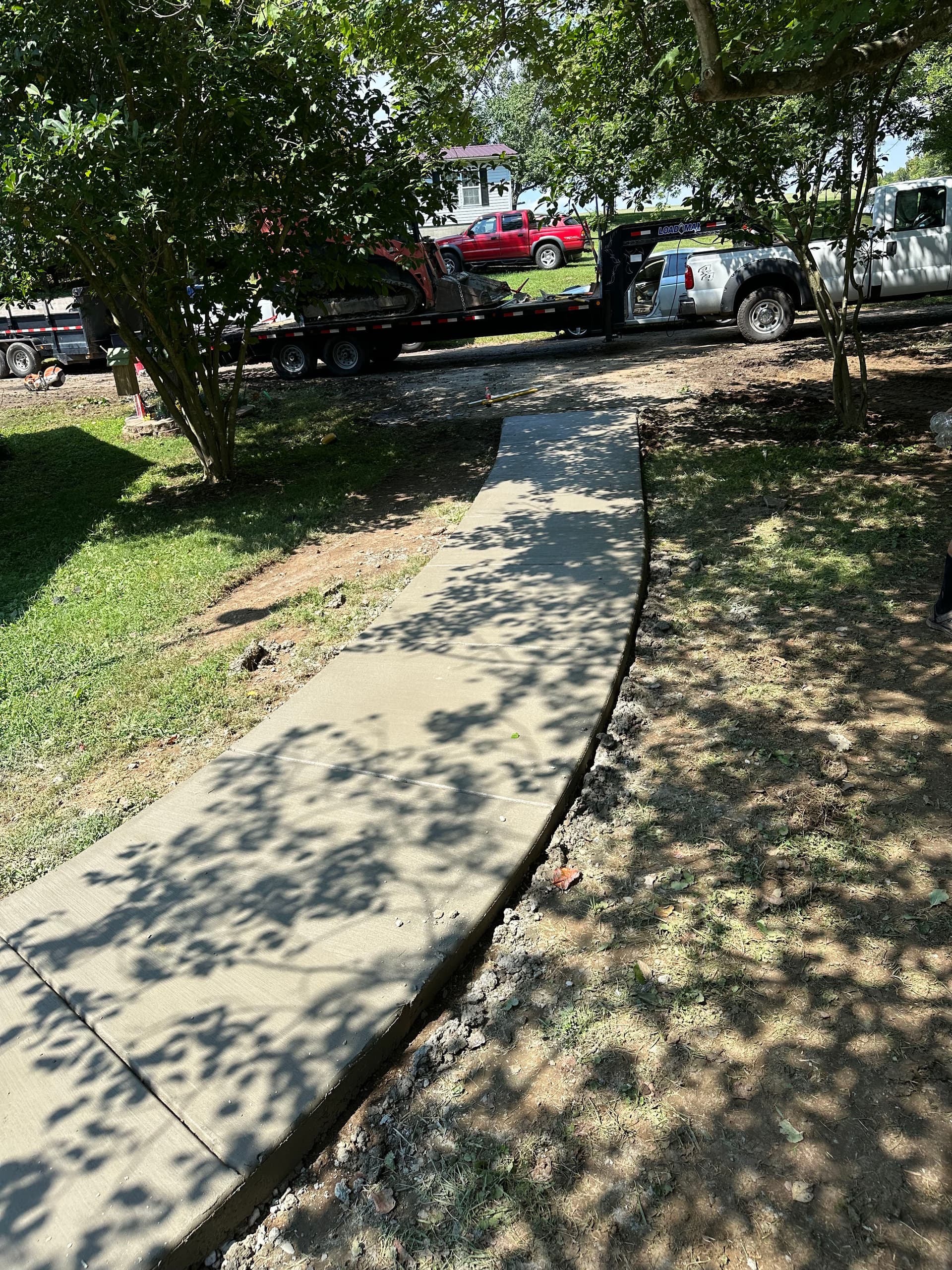 75 Feet of New Concrete Sidewalk and Rear Porch Pour image