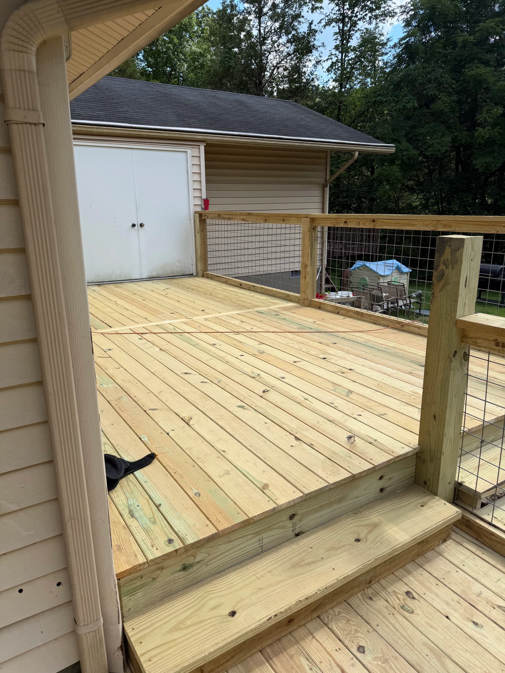 Gallery photos for Old Rotted Deck Replaced With a Bigger Wraparound Pool Deck: Image #3