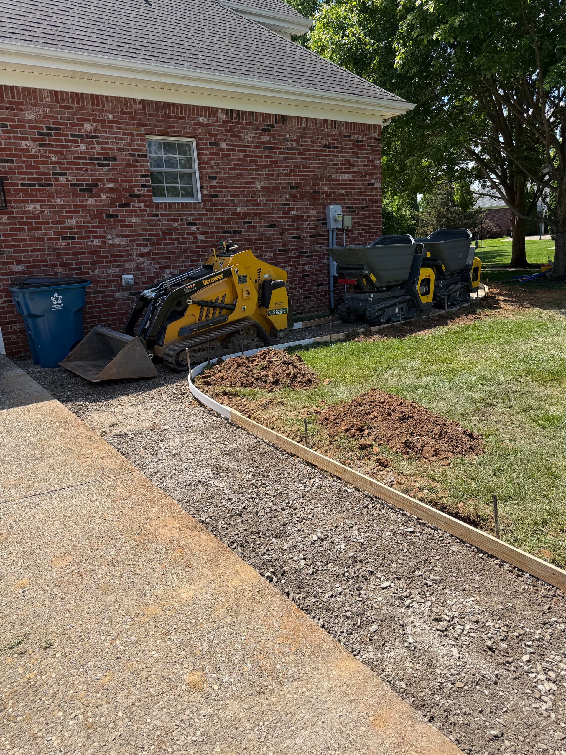 Gallery photos for Sunken Paver Patio Replaced With a Larger Exposed Concrete Outdoor Patio: Image #6