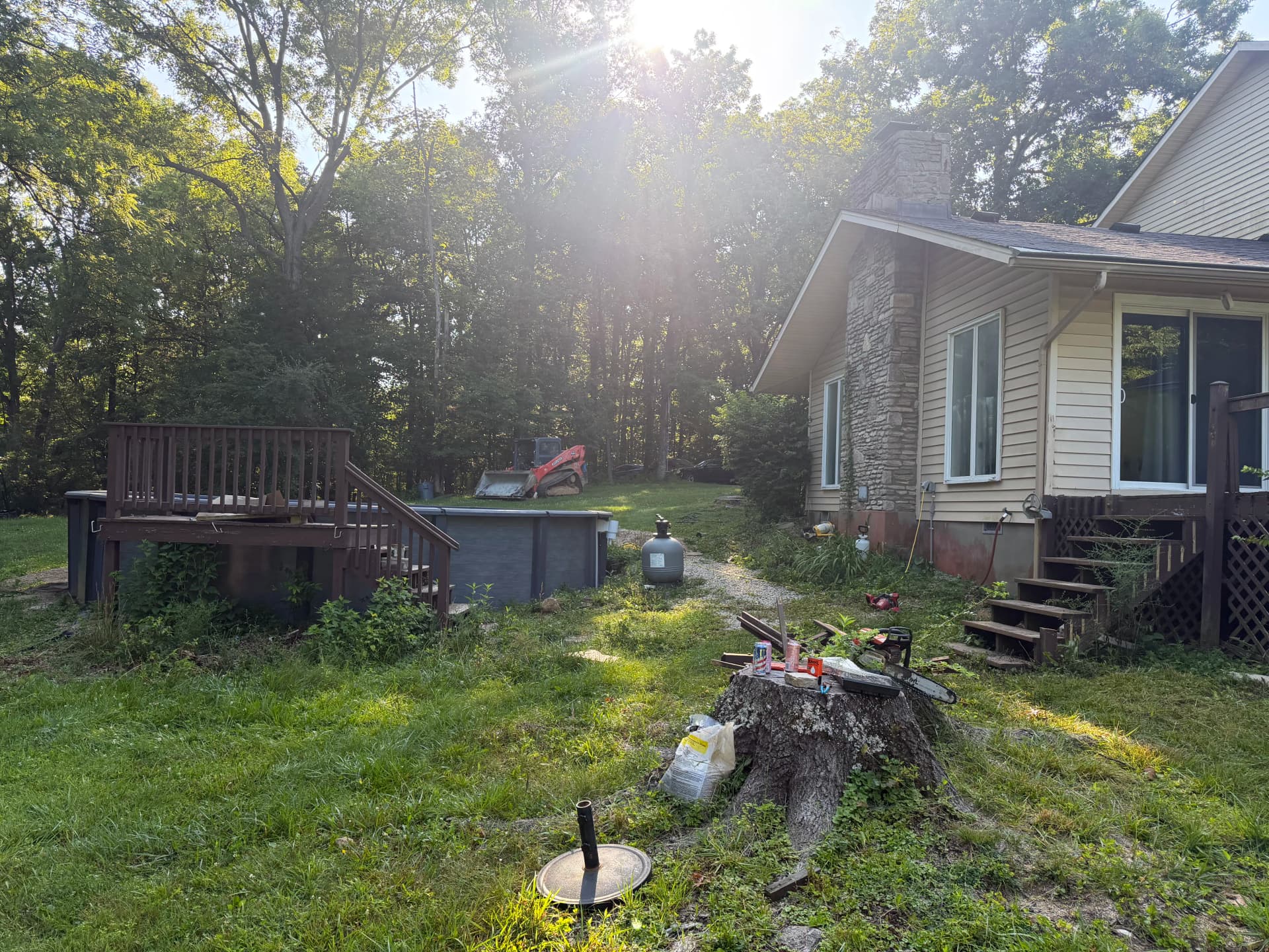 Gallery photos for Old Rotted Deck Replaced With a Bigger Wraparound Pool Deck: Image #1